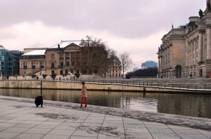 A model posing for a shoot in freezing temps for Fashion Week