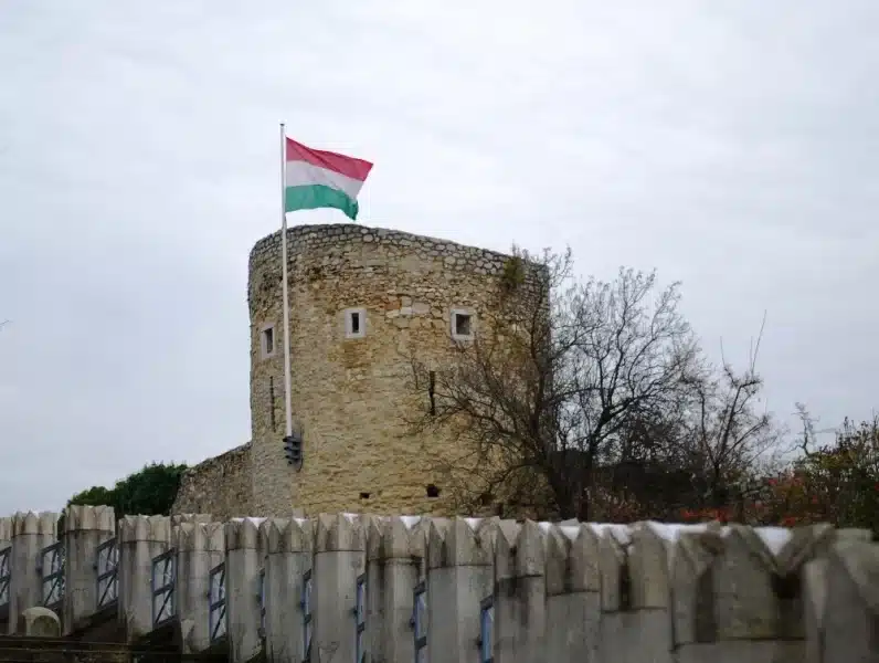 Pecs Tower with flag located in Pecs Hungary