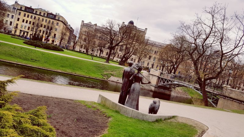 Enjoying the view of Riga from the banks of the river