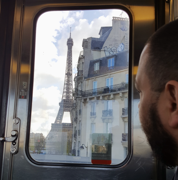 Looking out the window on the Paris Metro. 