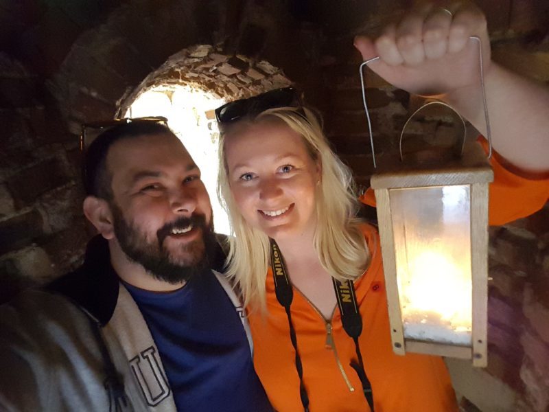Exploring Cesis Castle by candlelight
