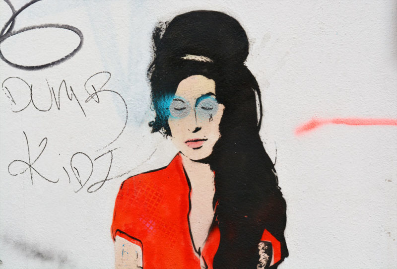 Amy Winehouse Camden street art by Bambi. Just one of the many pieces of Camden street art that you can encounter when taking the time to explore the Camden area. 