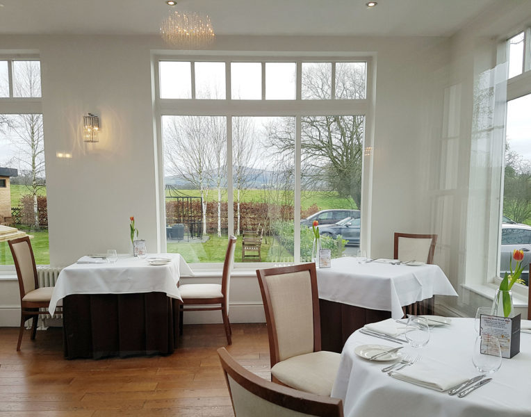 Forelles restaurant with table and chairs at Fishmore Hall