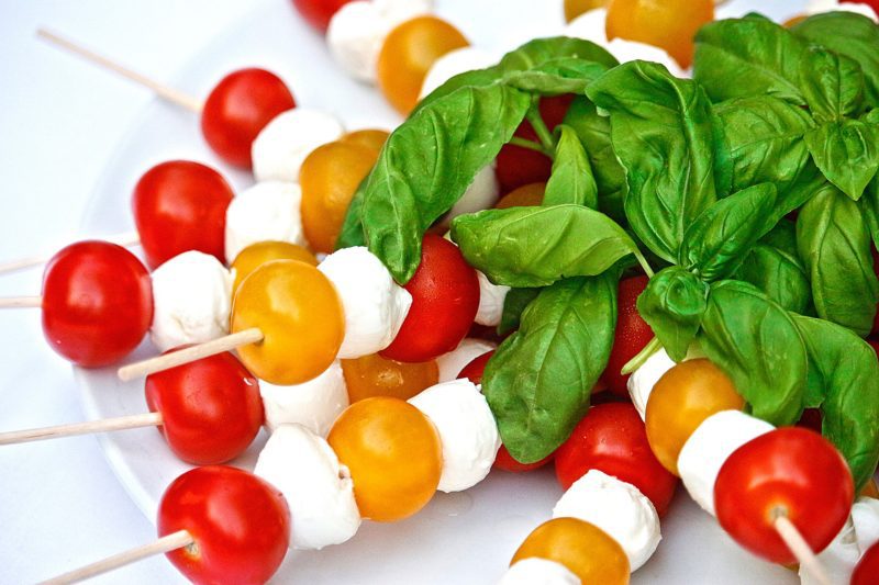 Cherry tomato, cheese, basil skewers. The delicious Mediterranean diet. 