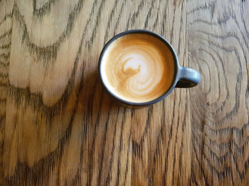 Cappuccino on wooden table