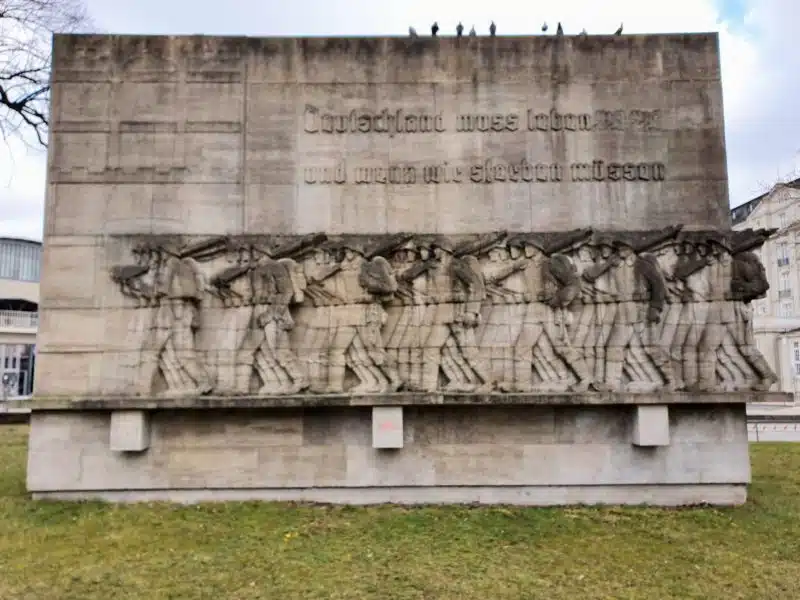 76th warrior memorial is a large stone memorial in a park in Hamburg Germany 