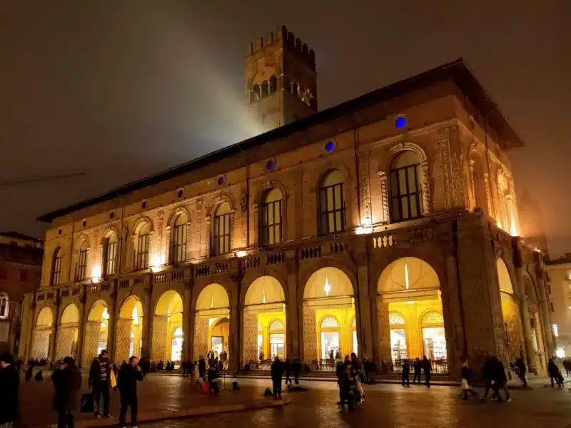 The exterior of the Palazzo Re Enzo during the evening in Bologna Italy. 