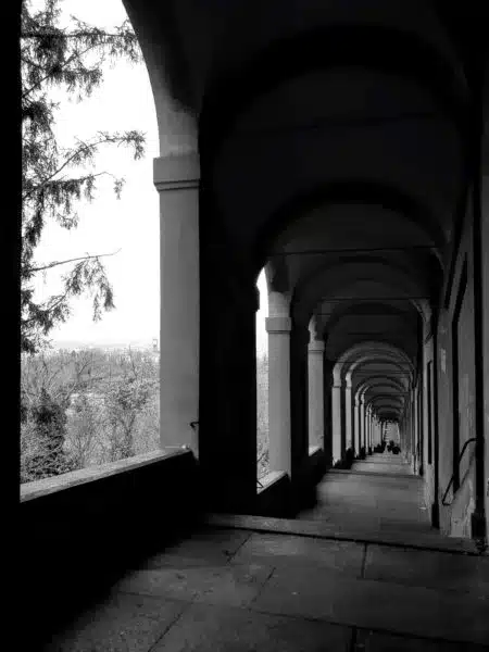 The long view of the San Luca Monastery porticoes in black and white