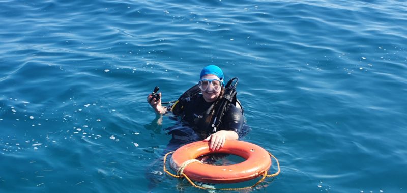 Roma in the water SCUBA Diving off Silk Caye in Belize