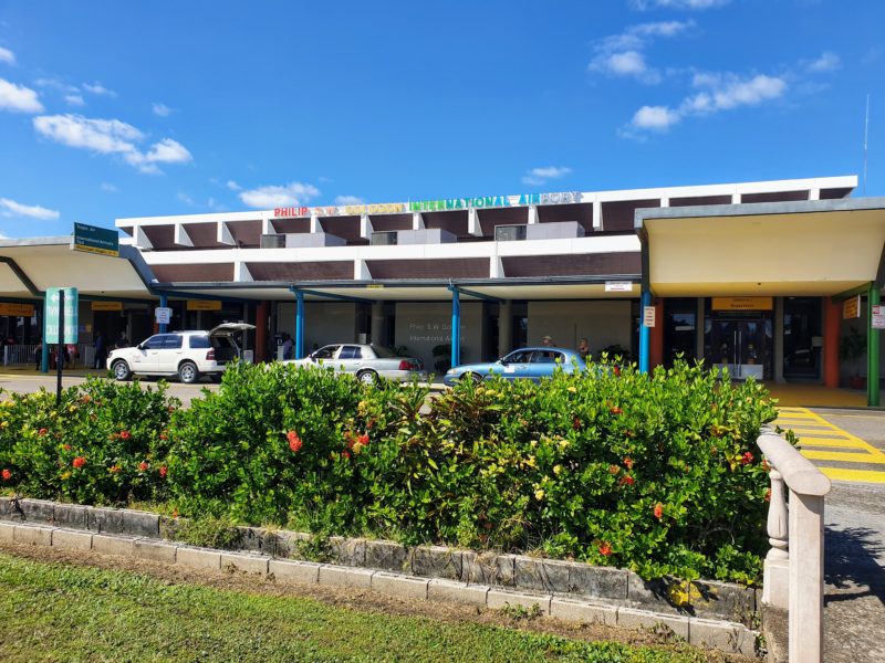 Exterior of airport. Buying a SIM card in Belize