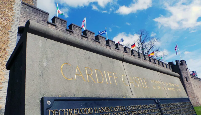 The view of the Cardiff Castle engraved gold lettering set in stone work