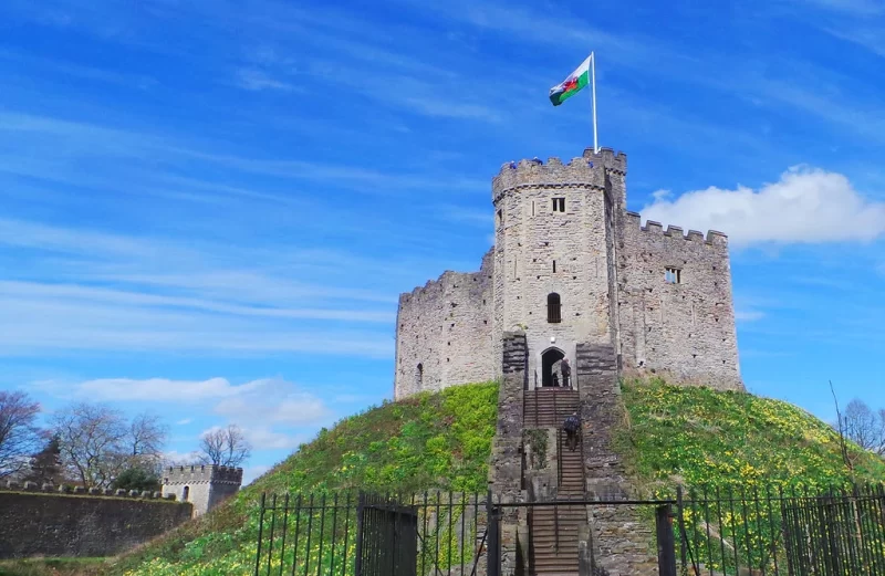 Cardiff Castle sitting high atop a grassy mount