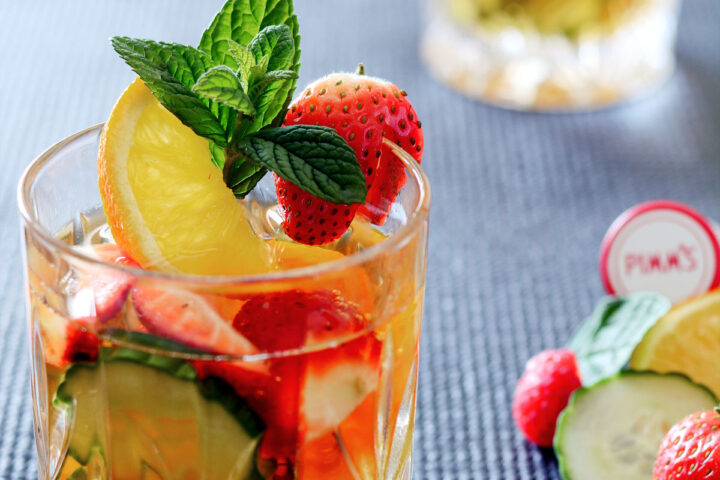 Glass with pimms and fruit