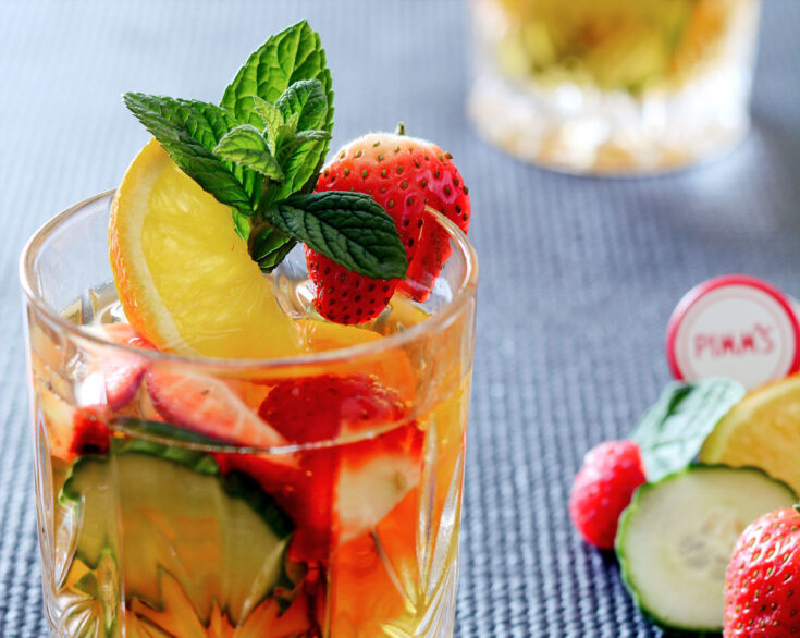 Glass with pimms and fruit