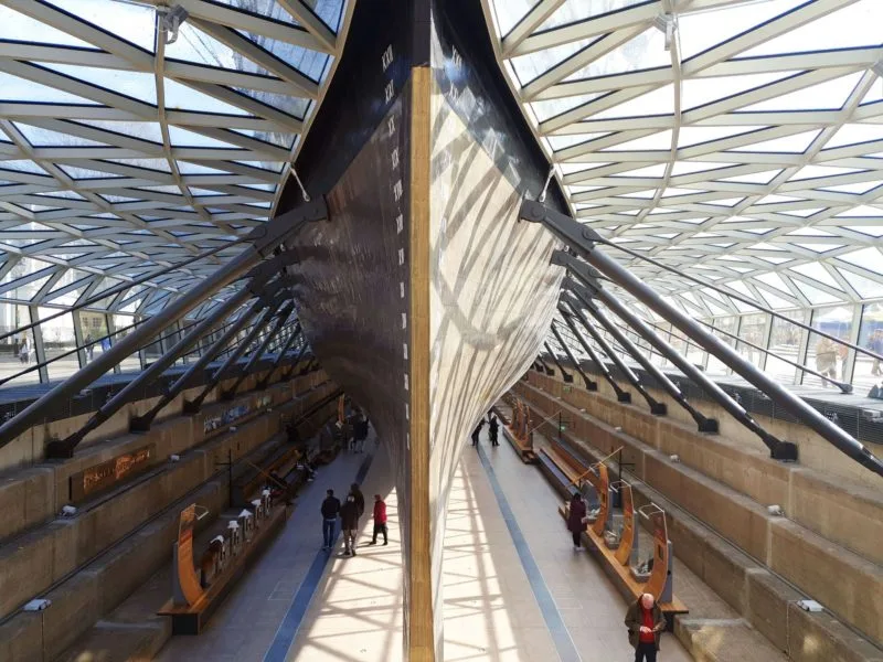 The imposing Cutty Sark from the side showing its large hull. 