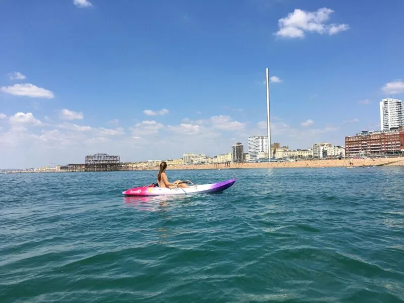 For a Day Trip from London try Brighton. Sea views with woman in kayak. 