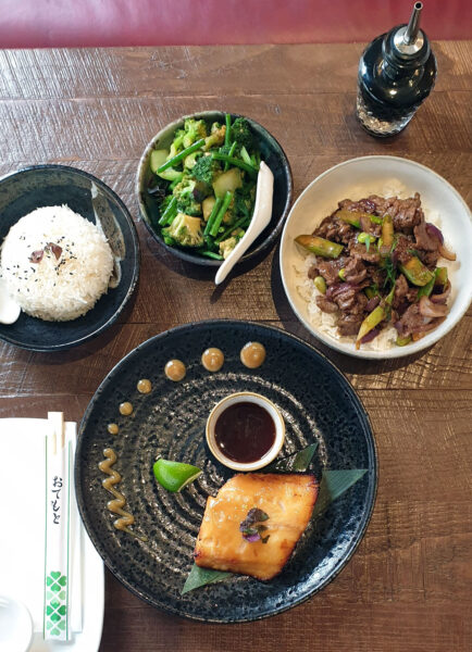 Flat lay main dishes at pan Asian restaurant OKA Marylebone