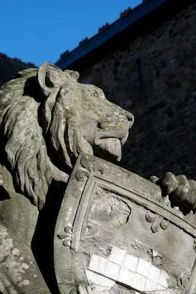 Lion sculpture at the Animal Wall of Cardiff Castle. One of many things to do during a weekend break in Cardiff.