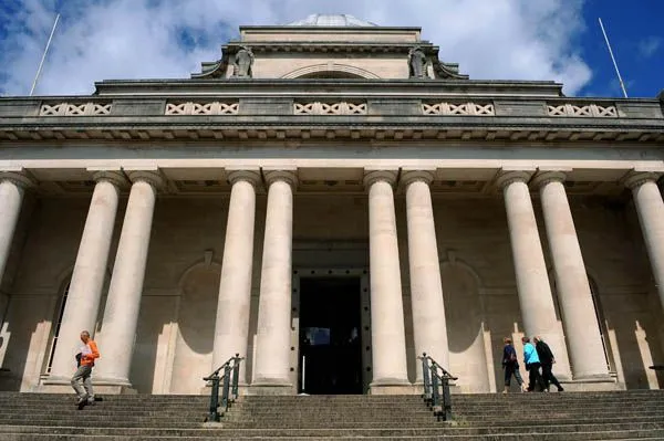 Exterior of the National Museum Cardiff with its grand pillars. Just one of many things you can do on a short break in Cardiff