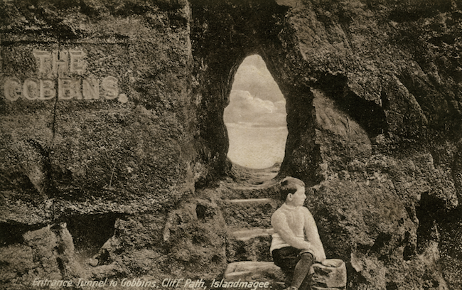 A sepia coloured postcard showing Wise's Eye at The Gobbins