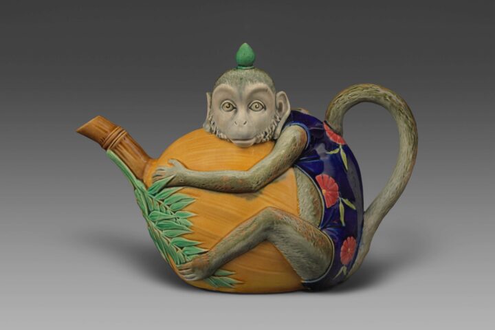 Majolica pottery tea pot in the shape of a monkey