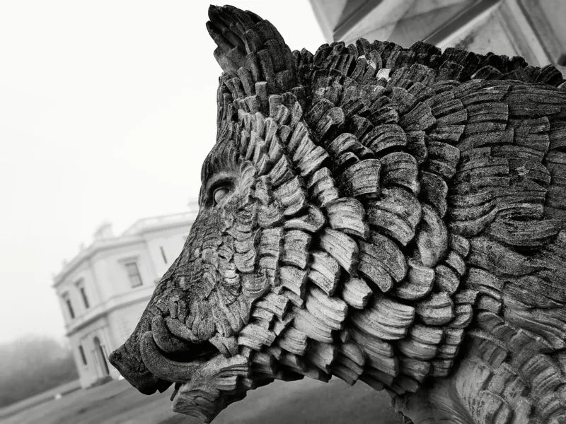 black and white photo of boar sculpture at the entrance to Osborne House