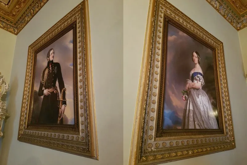 Portraits of Queen Victoria and Prince Albert hanging in Osborne House