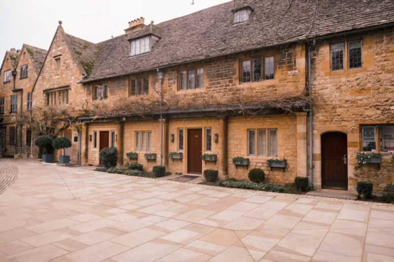 Exterior of building with paved walkway in front. One more fantastic place to visit to add to your day trip from London list