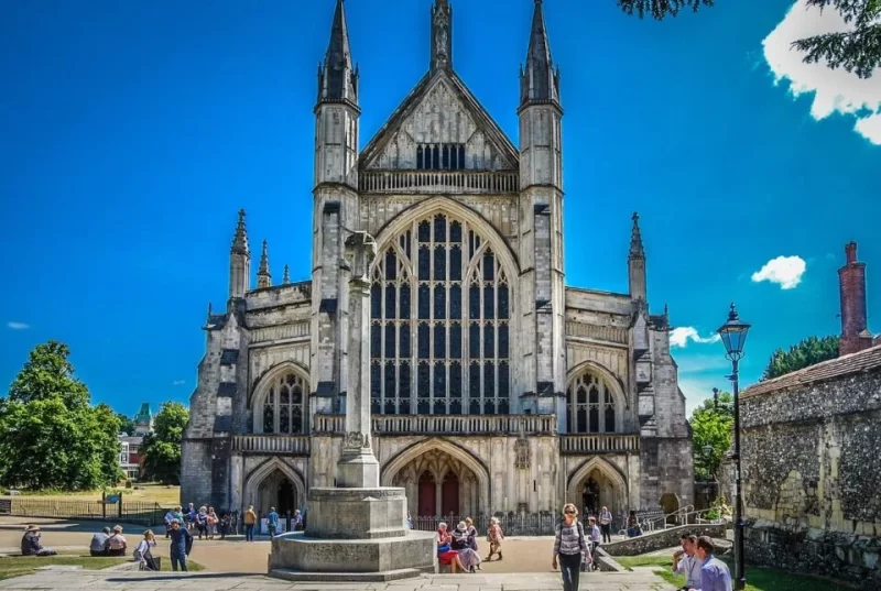 Exterior of Winchester Cathedral. One more fantastic place to visit to add to your day trips in London list