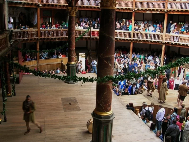 Interior view of a performance at Shakespeare's Globe Theatre