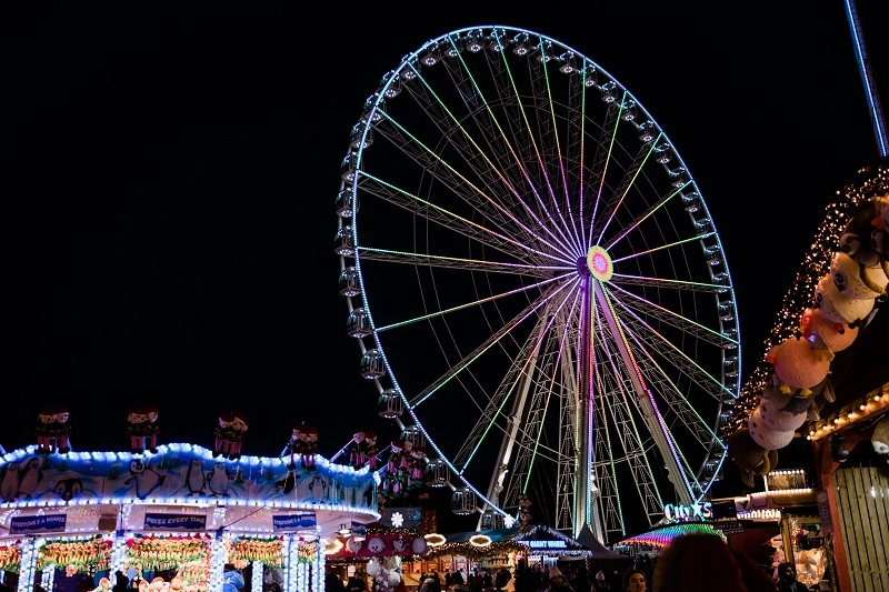 The Giant Wheel lit up at night