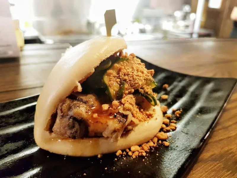 Close up of Braised pork belly bao dish at Yuu Kitchen