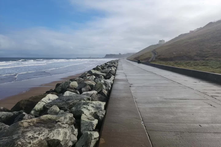 Path along the Whitby beach promenade, part of the Cleveland Way in the North York Moors