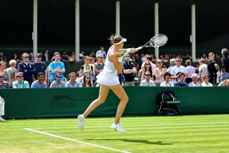 Just one of many action shots captured at Wimbledon. Photo by T. Lam