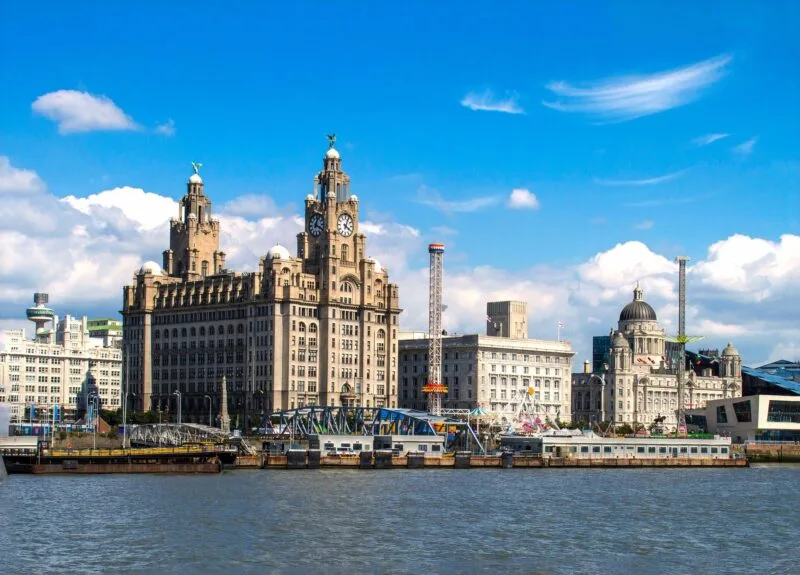 Wide view of Liverpool from the water with city skyline