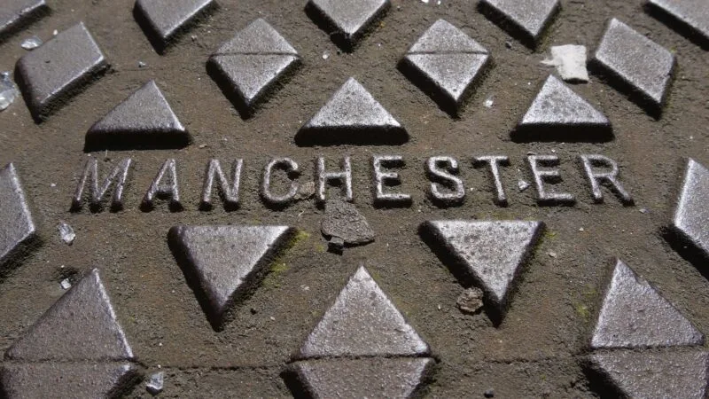 Manchester printed on metal underground cover