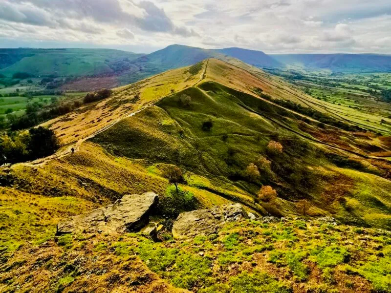 The green and rugged landscape of the Peak District