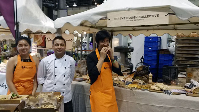 The team from Dough Collective standing in front of their stall at Vino Paradiso